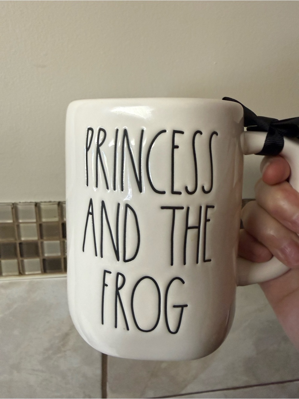 Rae Dunn princess and the frog mug.